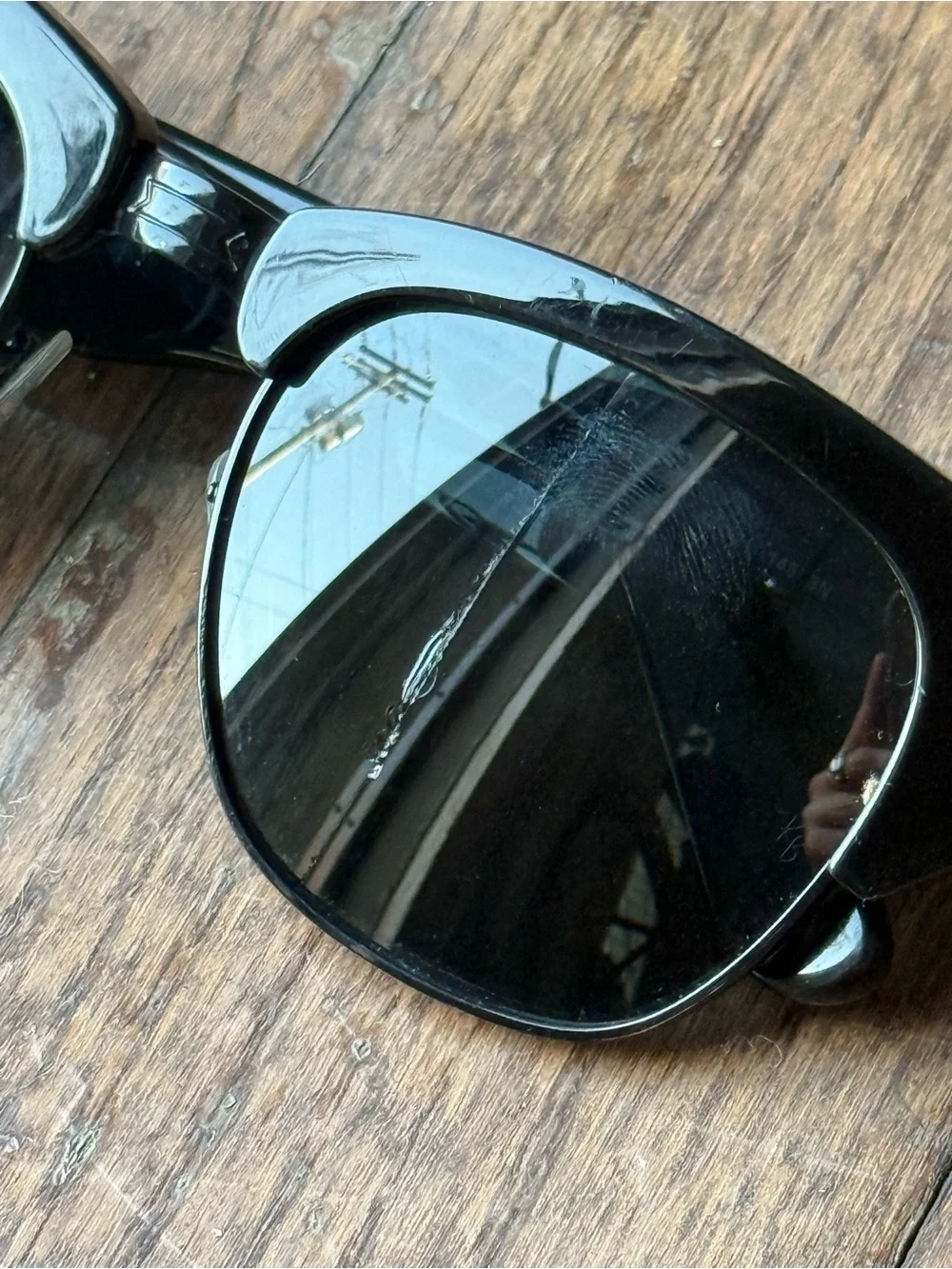 Ray-Ban Black Frame Sunglasses with Dark Lenses